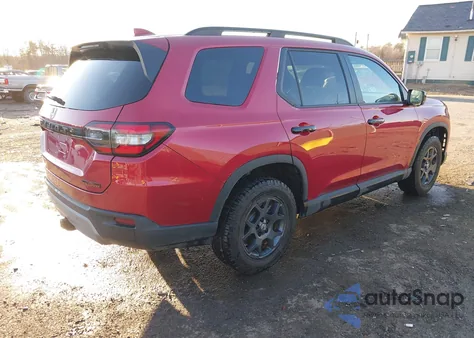 2025 Honda Pilot Trailsport z USA, uszkodzony, nr VIN 5FNYG1H60SB144990